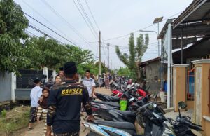 Giat Penertiban Parkir Makam, Banser Karangjompo Jaga Tradisi Ziarah